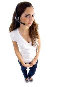 attractive female wearing headphone on an isolated white background
