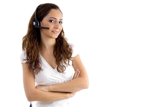 folded arm female talking on headphone with white background