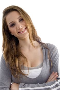 attractive female with folded arms on an isolated background