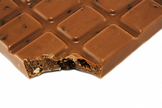 Close-up image of milk chocolate with nuts