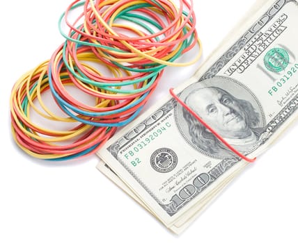 concept last dollars in desk, few dollars and many empty rubber band, isolated on white