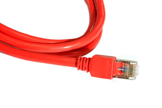 Close up of a red network cable on light background