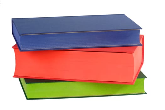 Three coloured books - isolated on white background
