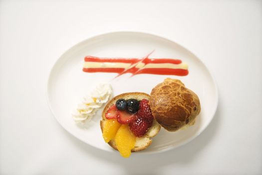 Fresh fruit stuffed brioche with vanilla anglaise.