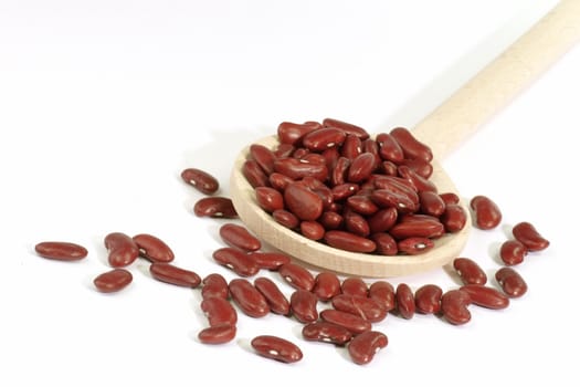 Red Kidney Beans on a wooden cooking spoon