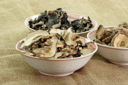Dried asias mushroom mix on brown Background
