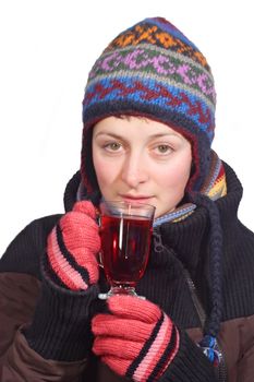 Young woman drinking tea. On white.
