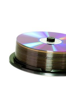 Dvds on a spindle on white background