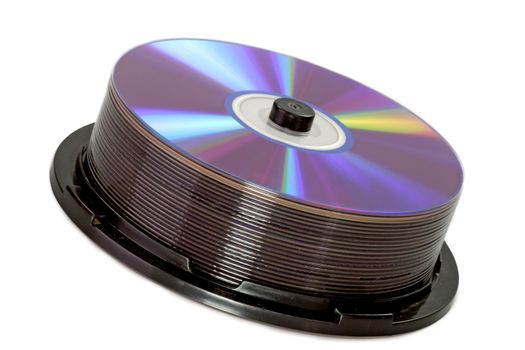 Shiny DVDs on a spindle on white Background