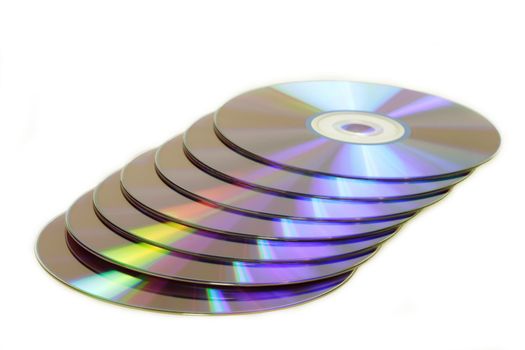A lot of shiny DVDs in a row on white background