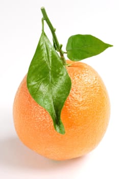 Orange with leaf, studio isolated over white background

