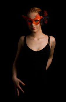 mysterious lady in red mask ready to dance