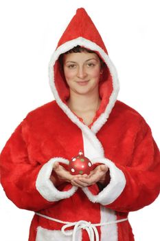 Young santa girl holding a christmas tree ball - isolated on white background