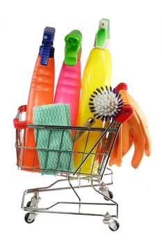 Cleaning equipment in a modell shopping trolley on white background