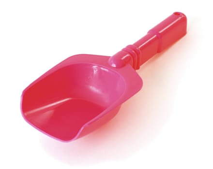 Red plastic shovel on the white background