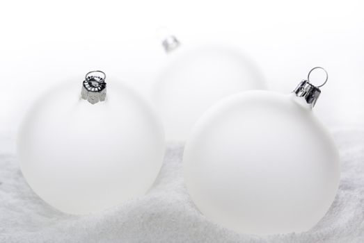 Christmas balls lying on the snow. aRGB.