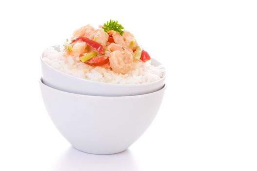 Thai green curry shrimp served with white rice.