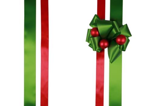 Red and green ribbons with bow, isolated, ready for overlay over a gift box