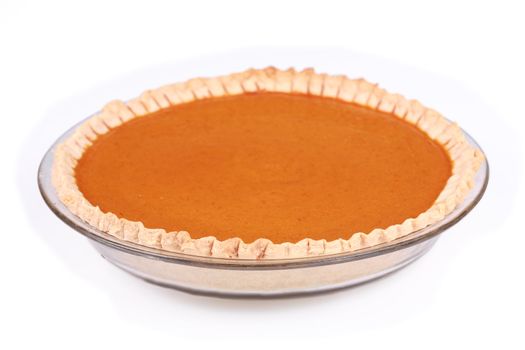 Homemade Pumpkin Pie isolated on white background