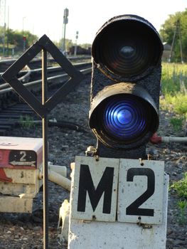 Dark blue signal of a small railway traffic light