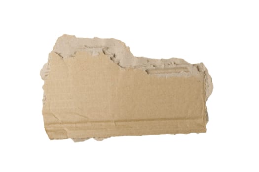Piece of torn brown cardboard on white background