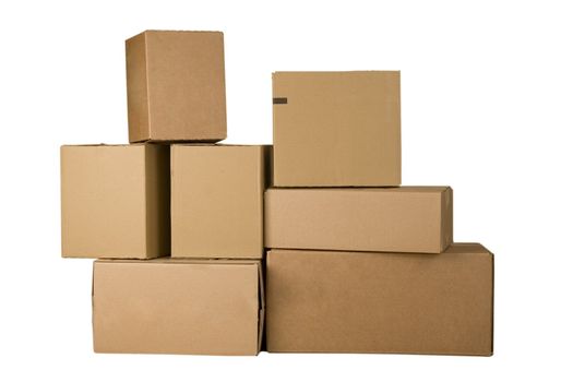 Brown different cardboard boxes arranged in stack