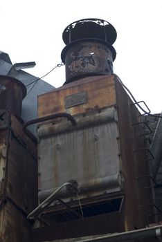 a rusted old roof top refrigeration unit