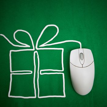 Online present shopping concept, mouse on green background with present