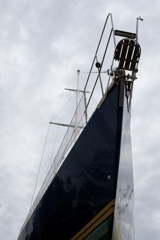Blue hull sailboat photographed from an original point of wiew