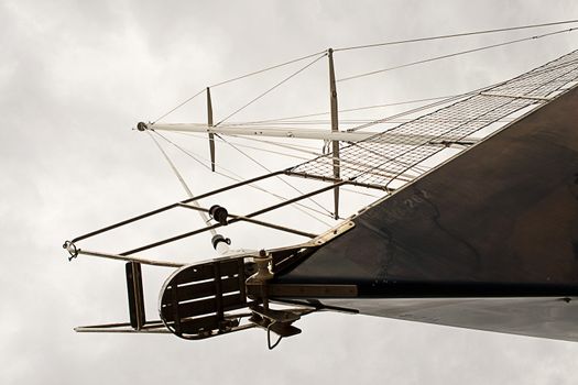 Blue hull sailboat photographed from an original point of wiew