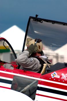 A view of open cockpit, when pilot put off the phones