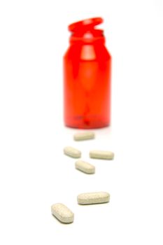 Prescription tablets isolated against a white background