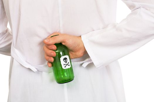 Hand in white overall with green bottle of poison on a white background