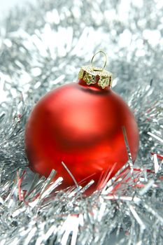 Christmas ornaments isolated on a tinsel