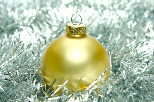 Christmas ornaments isolated on a tinsel