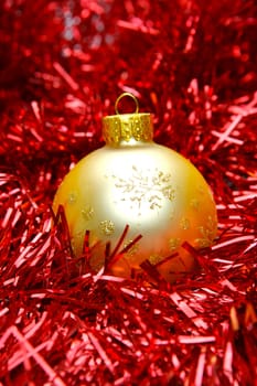 Christmas ornaments isolated on a tinsel