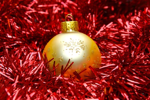 Christmas ornaments isolated on a tinsel