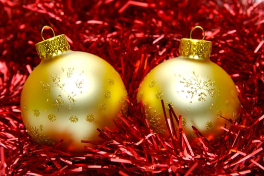 Christmas ornaments isolated on a tinsel
