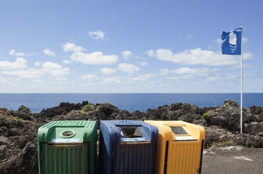Recycling point with three different bins in Faial, Azores, Portugal