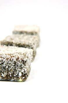 Lamingtons isolated against a white background