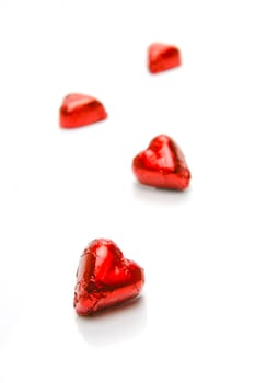 Chocolate love hearts isolated against a white background