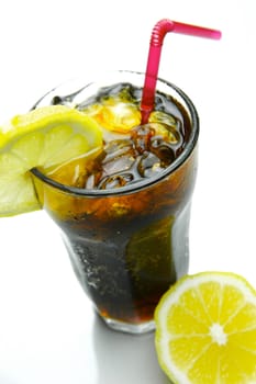 A glass of lemon cola isolated against a white background