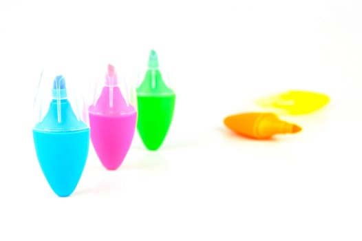 Mini highlighers isolated against a white background