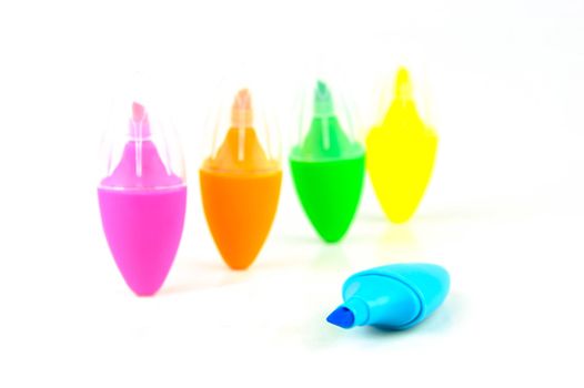 Mini highlighers isolated against a white background