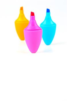 Mini highlighers isolated against a white background