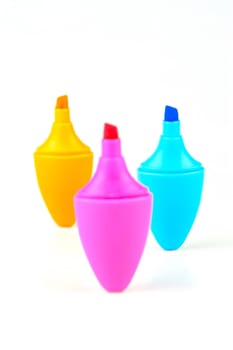 Mini highlighers isolated against a white background