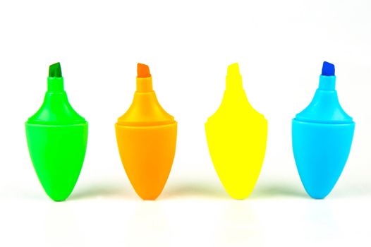 Mini highlighers isolated against a white background