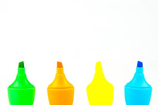 Mini highlighers isolated against a white background