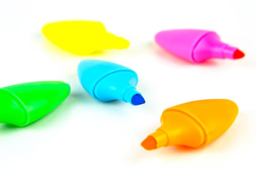 Mini highlighers isolated against a white background