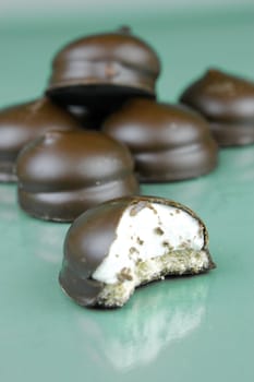 Marshmallow biscuits isolated against a green background